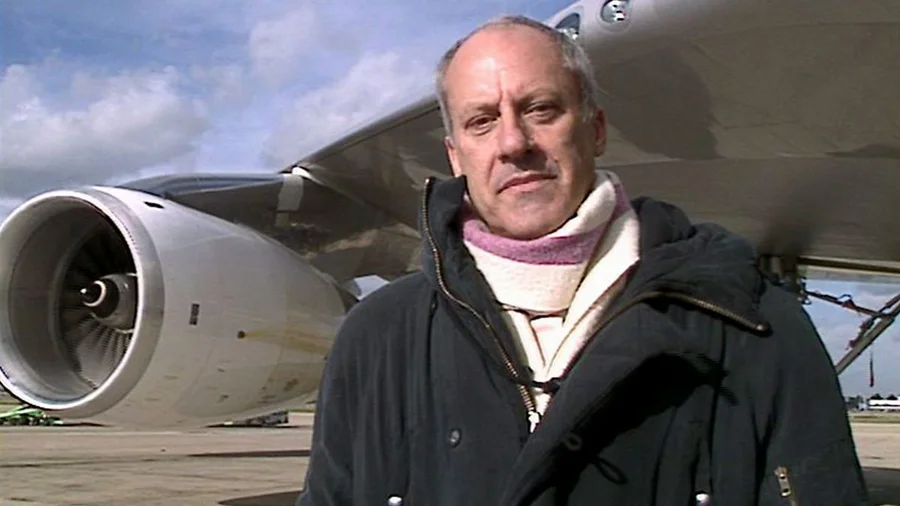 Sir Norman Foster in front of a Boeing 747